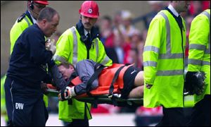 Jim Leighton is stretchered off during his final game, the Scottish Cup Final at Hampden.
